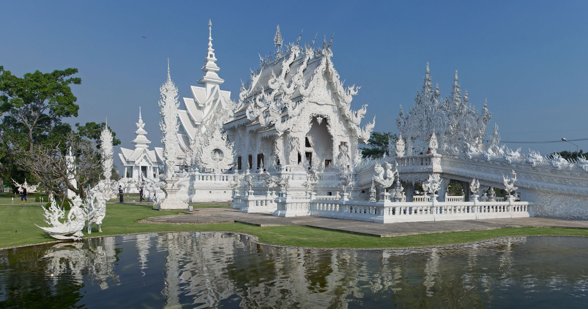 Admire the intricate details of the White Temple in Chiang Rai, a must-see attraction in Thailand.