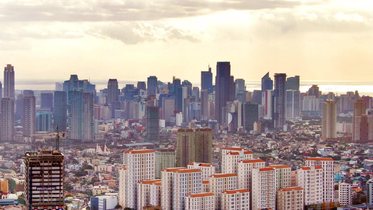 Aerial view of the colourful Bonifacio Global City at sunset