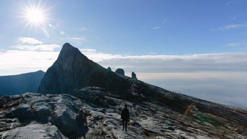 Climbers on Mount Kinabalu, an iconic attraction in Sabah