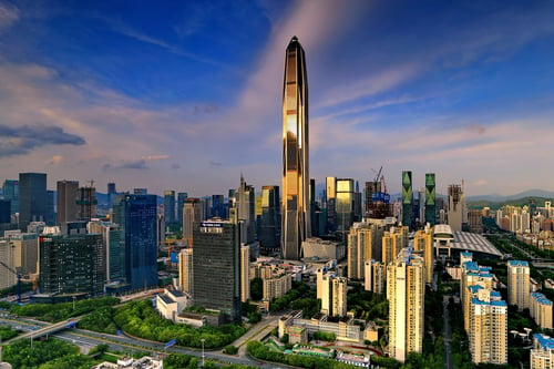 Couples viewing the cityscape from the Ping An Finance Centre experience what Shenzhen is famous for.