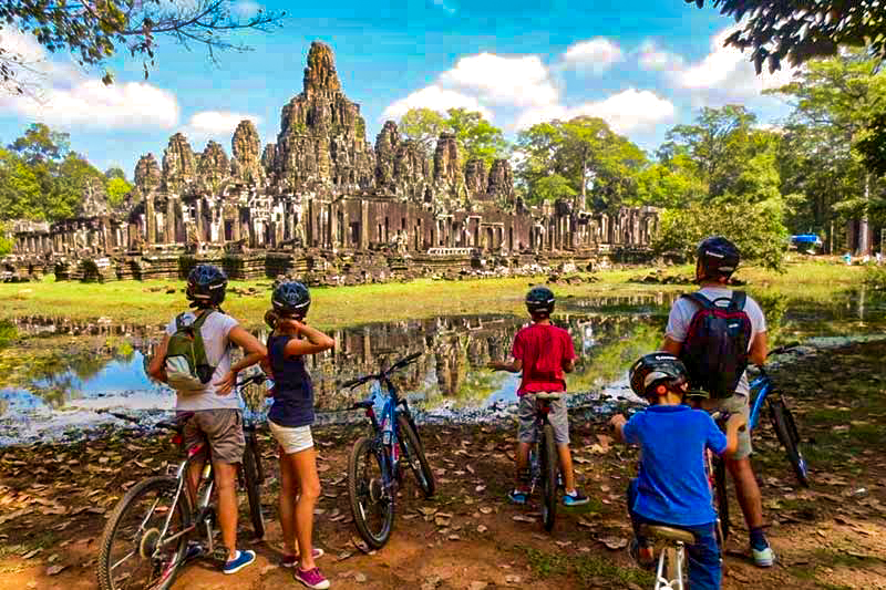 Cycle your way through Angkor Park to immerse yourself in the surroundings