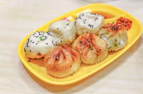 Enjoy the affordable and satisfying Yangs Dumplings, a local favourite spot offering a wide array of fried and steamed dumplings