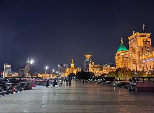 Experience the dazzling city lights of The Bund, a waterfront promenade with iconic buildings and a mesmerising skyline view