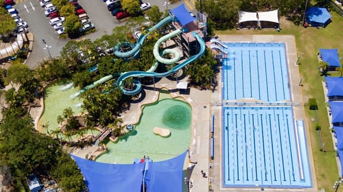 Family fun at Chermside Aquatic Centre with kids enjoying the water slides and pools