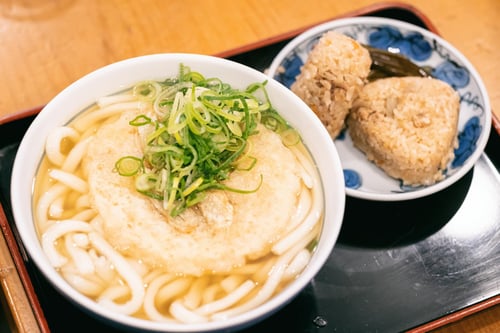 Hakata-style udon noodles, known for their chewy texture and rich flavours, is a specialty of Fukuoka