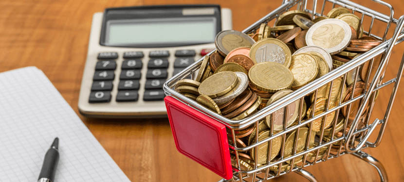 money, shopping cart & financial calculator