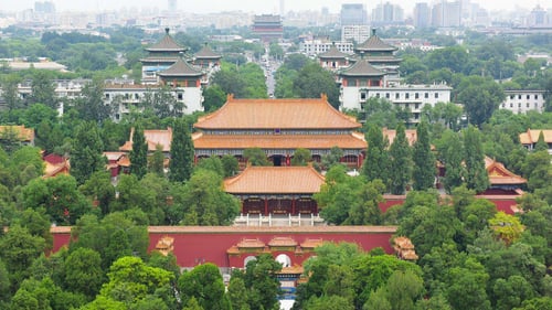 Jingshan Park offers panoramic views of Beijing attractions like the Forbidden City.