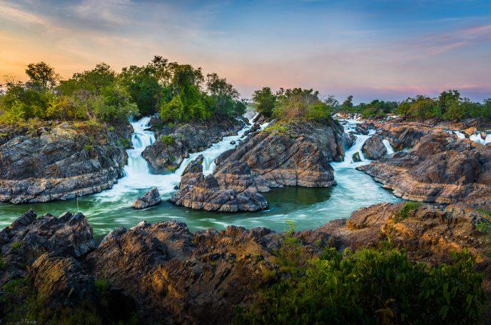 Khone Phapheng Falls, the largest waterfall in Southeast Asia, cascades over rocky terrain in Si Phan Don (4000 Islands)