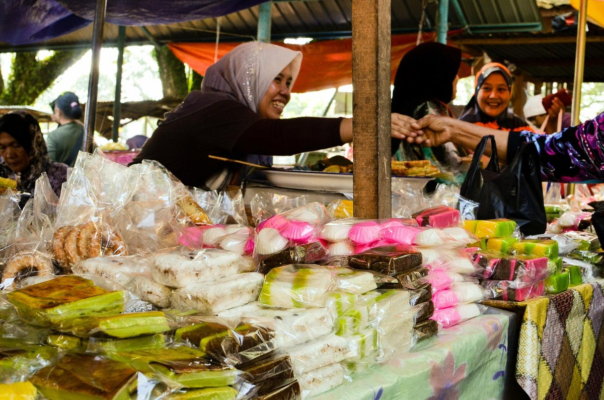 Lady selling traditional snacks at Kota Belud Tamu, a popular attraction