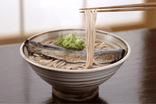 Nishin soba features soba noodles topped with sweetly simmered herring