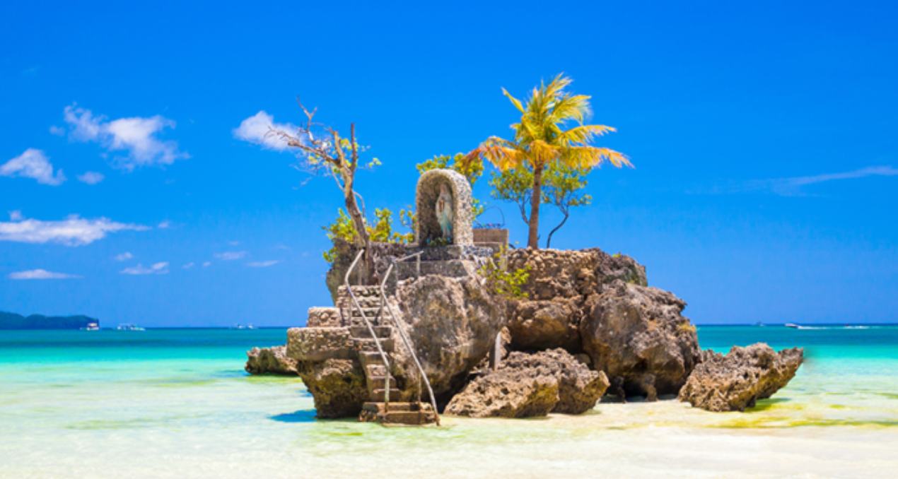 One of the interesting land activities in Boracay includes visiting Willy’s Rock