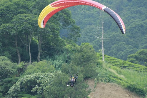 Paragliding at Bukit Gantole, one of the amazing things to do in Bandung