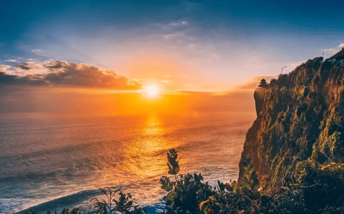 Stunning sunset view from Uluwatu Temple overlooking the ocean