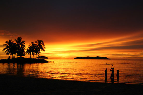 Sunset over  Tanjung Aru Beach, a hidden place in Sabah