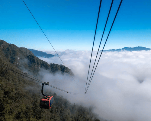 Taking a scenic cable car ride to the top of Fansipan Mountain is one of the top things to do in Sapa, Vietnam, offering breathtaking views of the surrounding landscape.