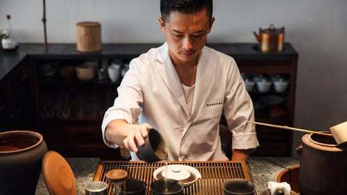 Tea master preparing tea at Sakurai in Aoyama, Tokyo