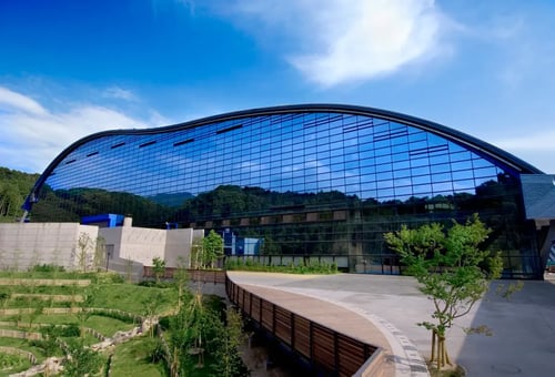 The Kyushu National Museum in Dazaifu features striking architecture with a beautiful garden and a traditional tea house