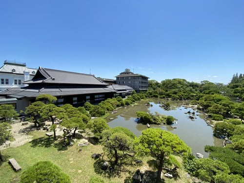 The Ohana Shoto-en Garden features meticulously maintained flora, charming pathways, and picturesque views of the surrounding canals