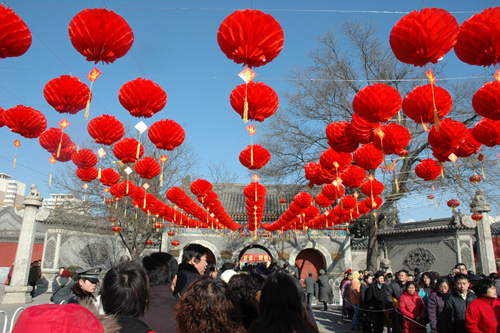 Touching the stone monkeys at White Cloud Temple is a must-do activity in Beijing.