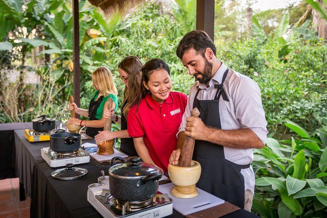 Tourists taking part in a cooking class in Cambodia