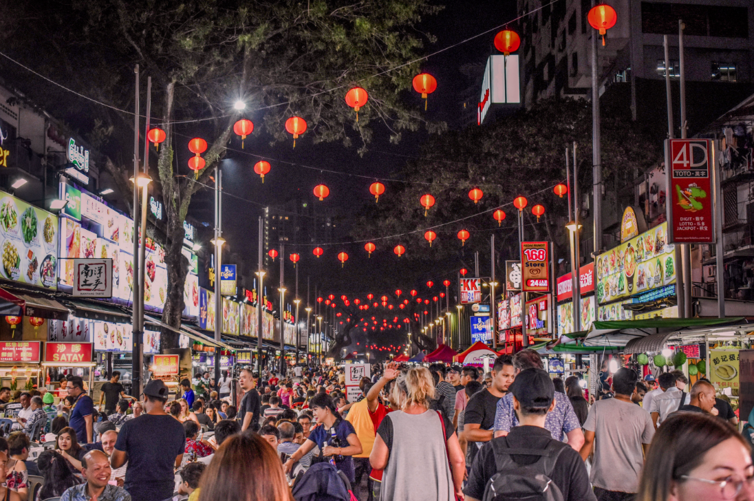 Tourists visit Jalan Alor food street at night since it’s one of the best things to do in KL