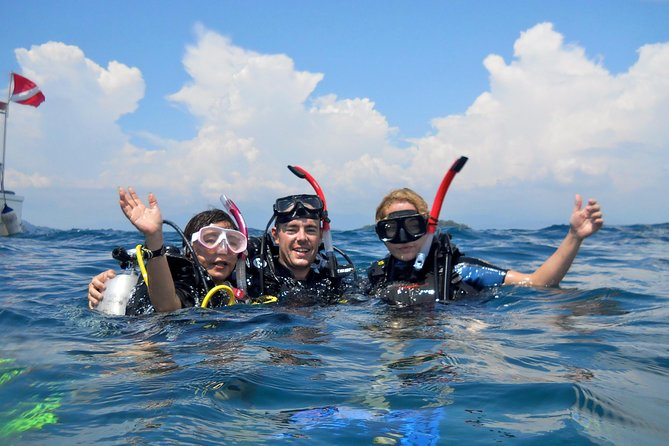 Travellers snorkelling at Tunku Abdul Rahman Marine Park, Sabah’s iconic attraction