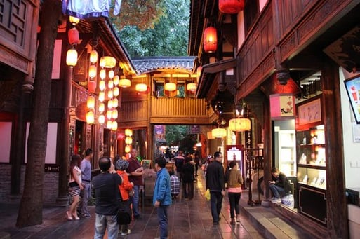 Visitors enjoying the beautifully illuminated Jinli Ancient Street, one of the top things to do in Chengdu at night.