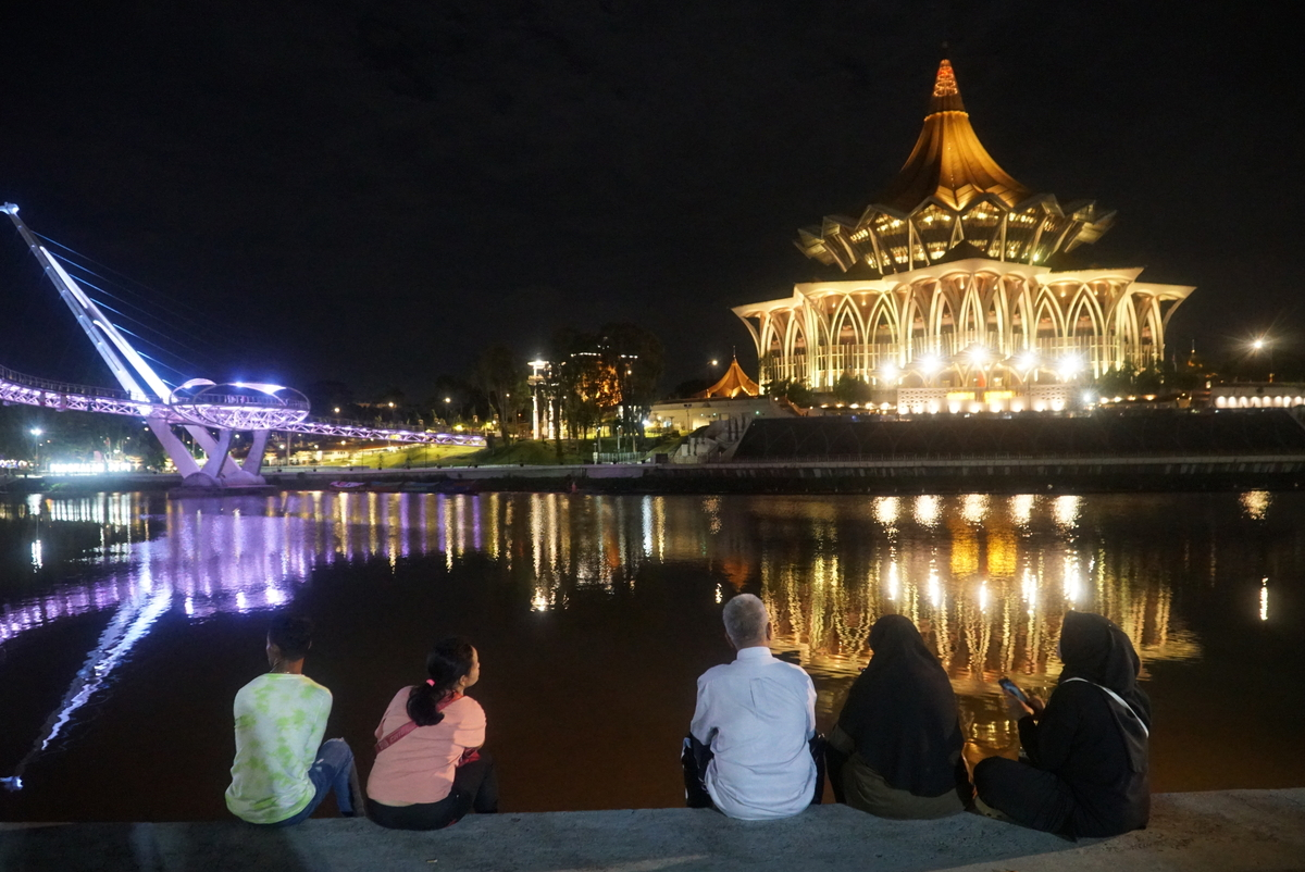 Visitors enjoying the night view at the Esplanade (Kuching Waterfront)