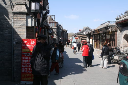 Walking through the ancient hutongs is a cultural experience and one of the top things to do in Beijing China.