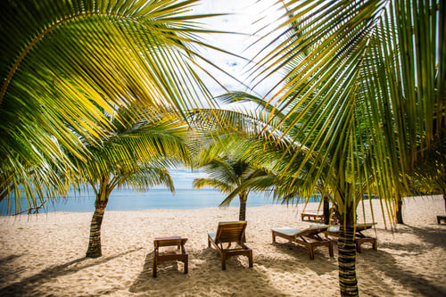 White sandy shores and crystal-clear turquoise waters of Phu Quoc Island beaches