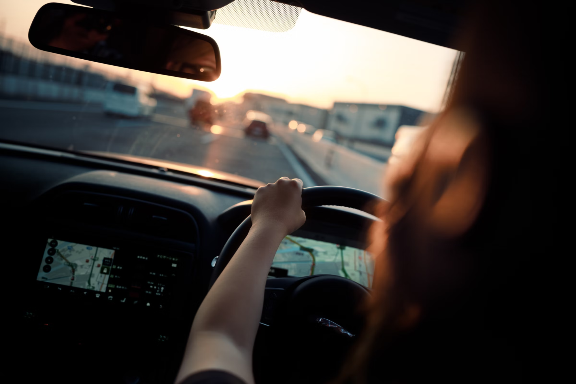 Woman driving a car in Malacca