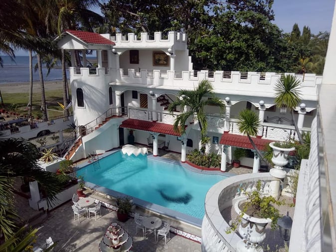 affordable batangas beach resorts in calatagan - White and Yellow Castle Hotel and Resort