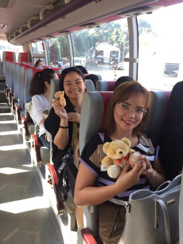 girls riding a P2P bus