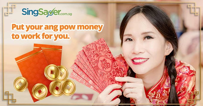 chinese girl smiling and holding ang pow - SingSaver