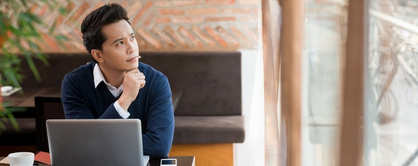 asian man thinking about the difference between par value and price of bond