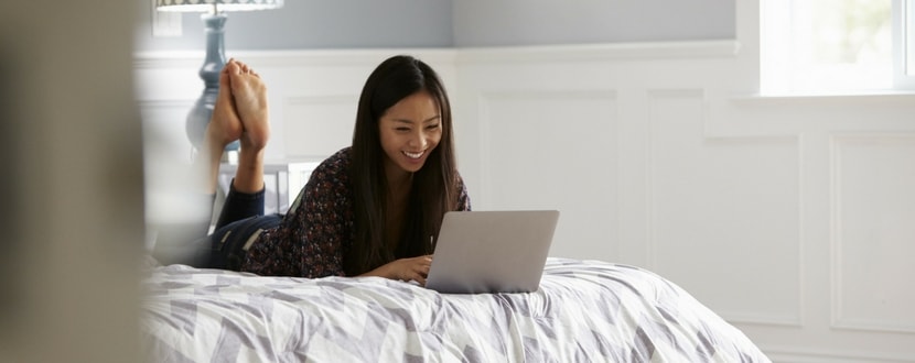 woman happy laptop