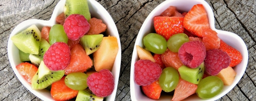 fresh organic cut fruits in bowl