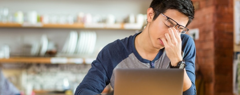 man worrying about insurance premiums