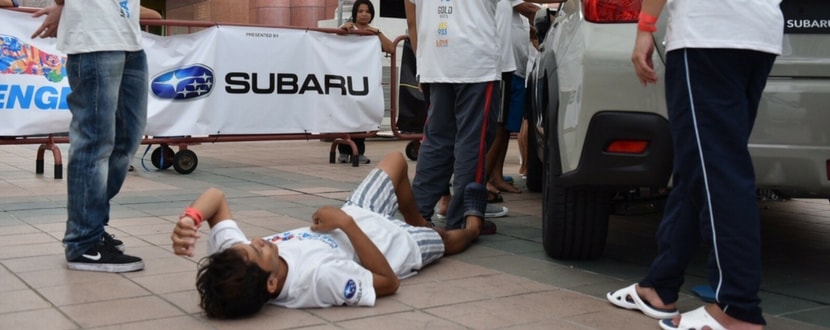 A contestant collapses at last year's Subaru Palm Challenge. Photo source: Channel News Asia