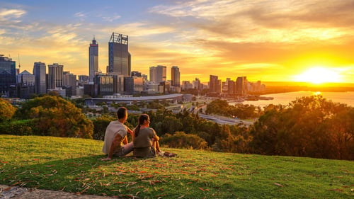 couple enjoying a sunset outdoors at a park attraction in perth