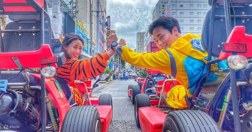 couple getting ready to go kart around okinawa