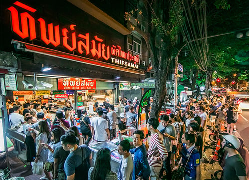 long queue outside thipsamai, a popular dining attraction in bangkok