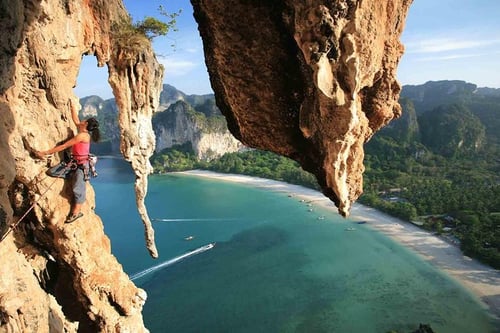 rock climbing at railay beach, an activity in krabi