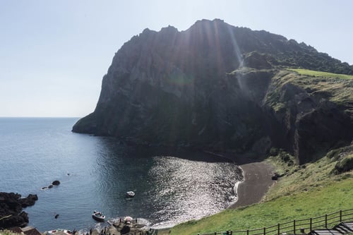 stunning view of seongsan ilchulbong in jeju island during the day