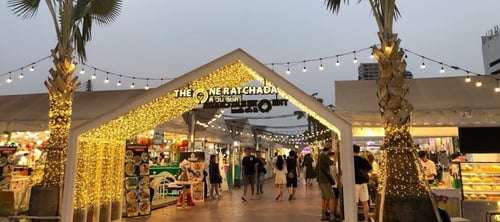 tourists exploring the one ratchada night market attraction in bangkok