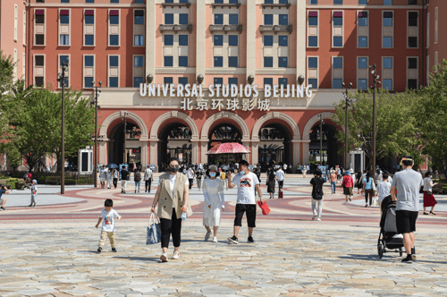 visitors walking into universal studios beijing