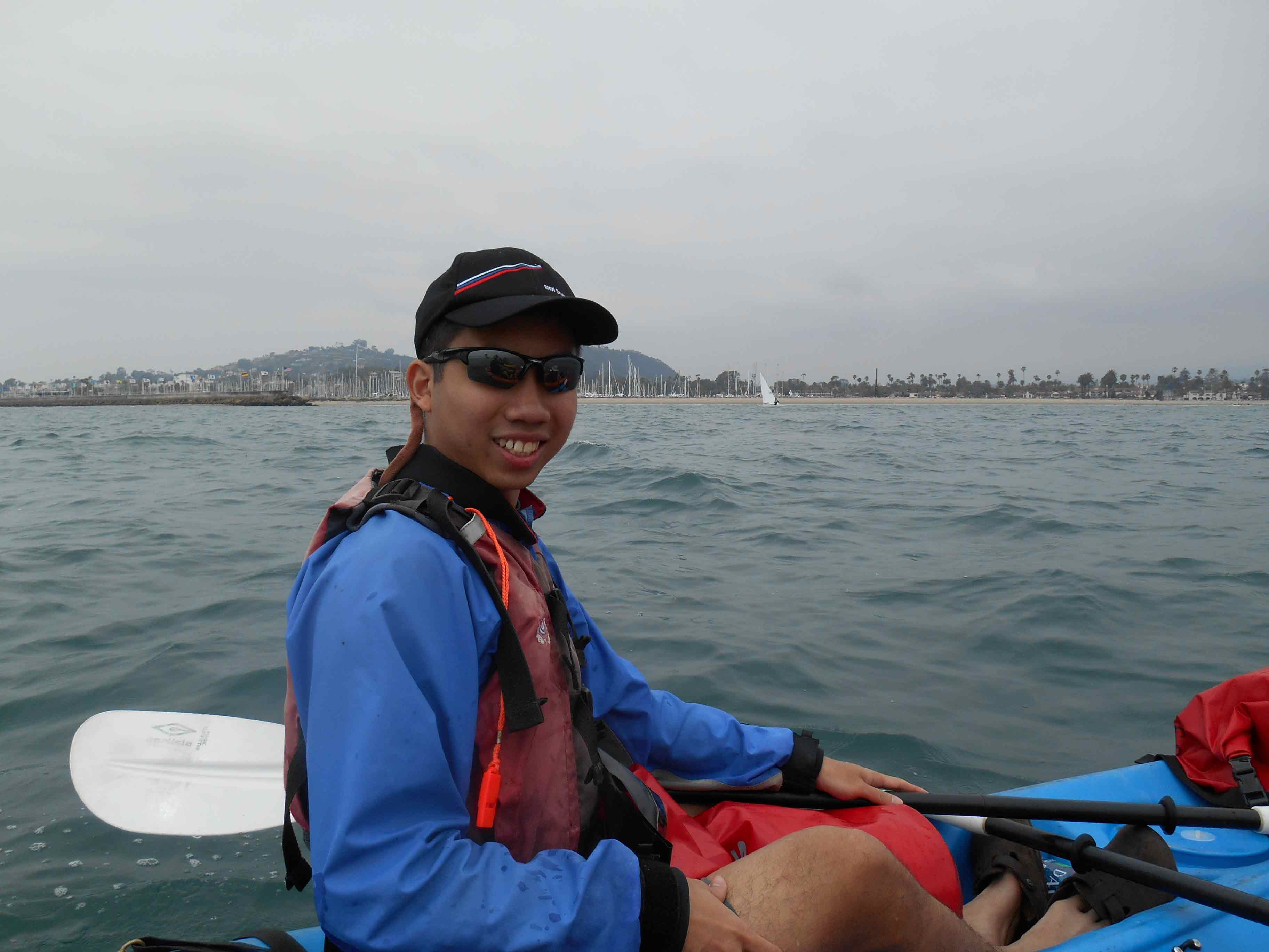 Travel hacking expert Aaron Wong, aka the MileLion, kayaking in Monterey.
